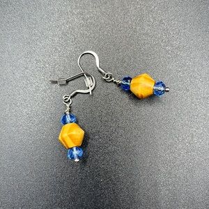 Wooden beaded earrings with blue accent beads